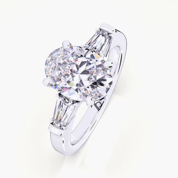 1.50 Carat Trilogy Ring with Oval Diamond and Tapered Baguettes