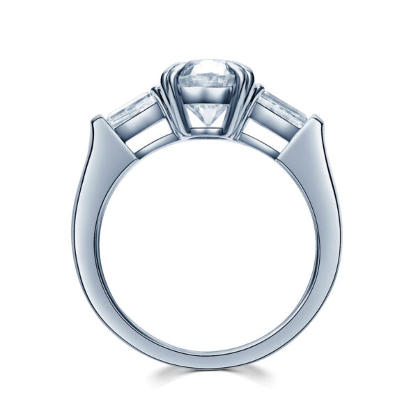 1.50 Carat Trilogy Ring with Oval Diamond and Tapered Baguettes - Image 2